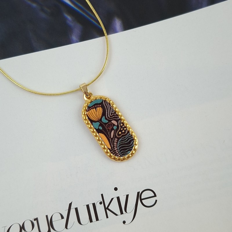 گردنبند بیضی گل نارنجی زمینه تیره استیل*