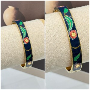 دستبند استیل میناکاری مشکی گل افتاب گردون*