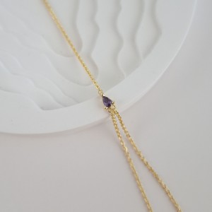 دستبند تمیمه نگین‌دار