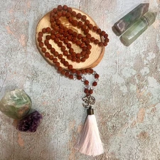 تسبیح  رودراکشا و کریستال کوارتز- 108  عددی با پلاک تبتی