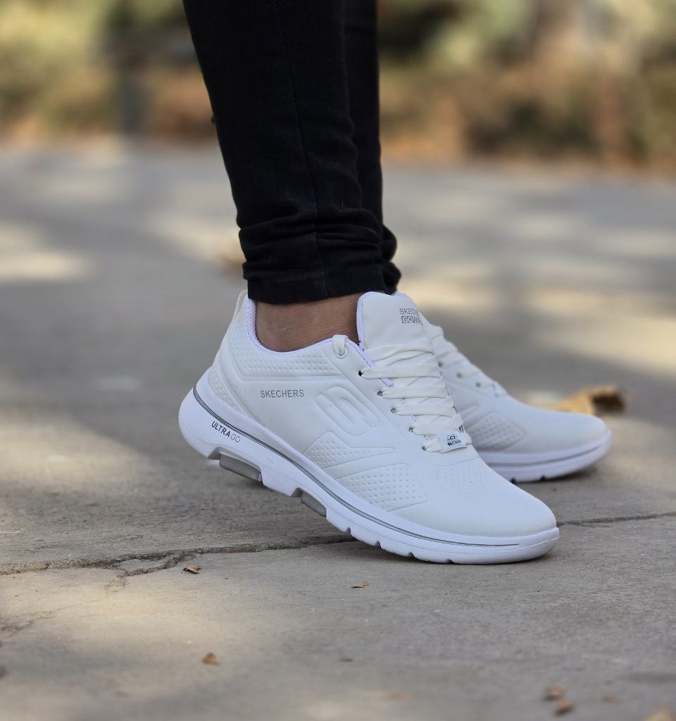 حراج واقعی کفش کتونی اسپرت مردانه و پسرانه مدل اسکیچرز رنگ سفید تمام فوق العاده زیبا و خوش پا با ارسال رایگان