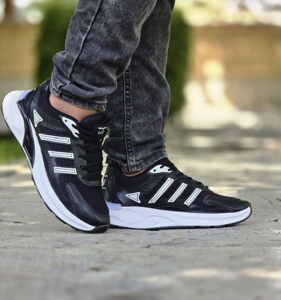 حرااج  فوق العاده کفش اسپرت مردانه  و پسرانه مدل آدیداس شیک و جذاب رنگ مشکی   سفید  با ارسال رایگان