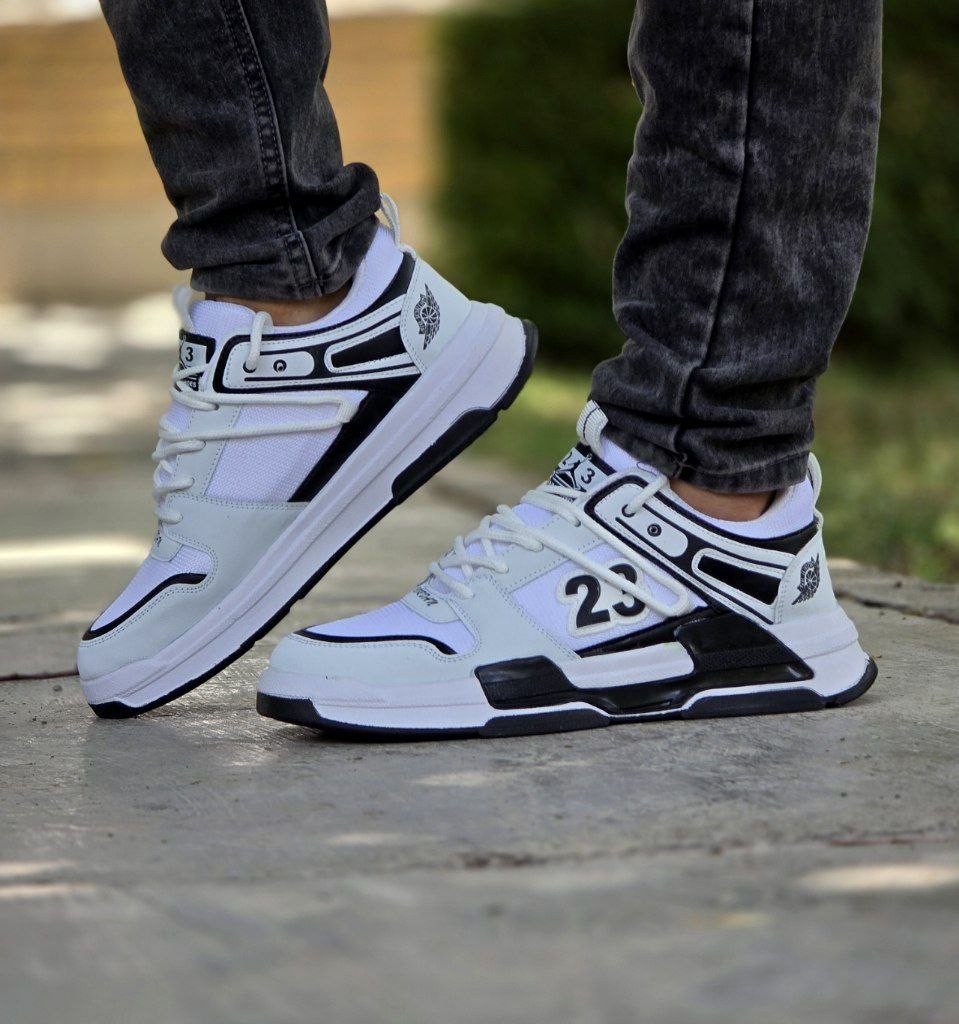تخفیف استثنایی  کفش اسپرت مردانه و پسرانه مدل جردن 23 رنگ سفید  زیره مشکی جذاب با ارسال رایگان