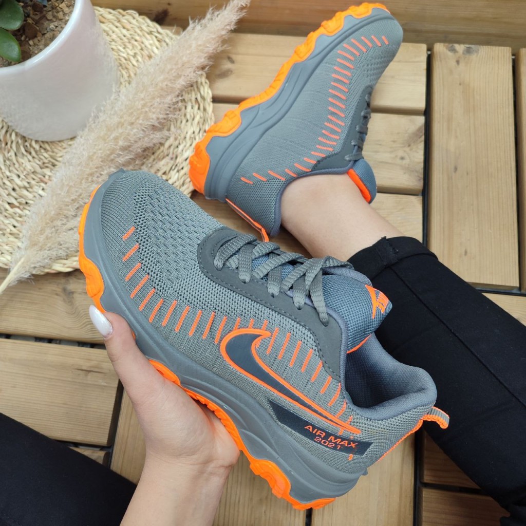 کفش اسپرت دخترانه  مدل نایک با طراحی منحصر به فرد طوسی نارنجی با ارسال رایگان