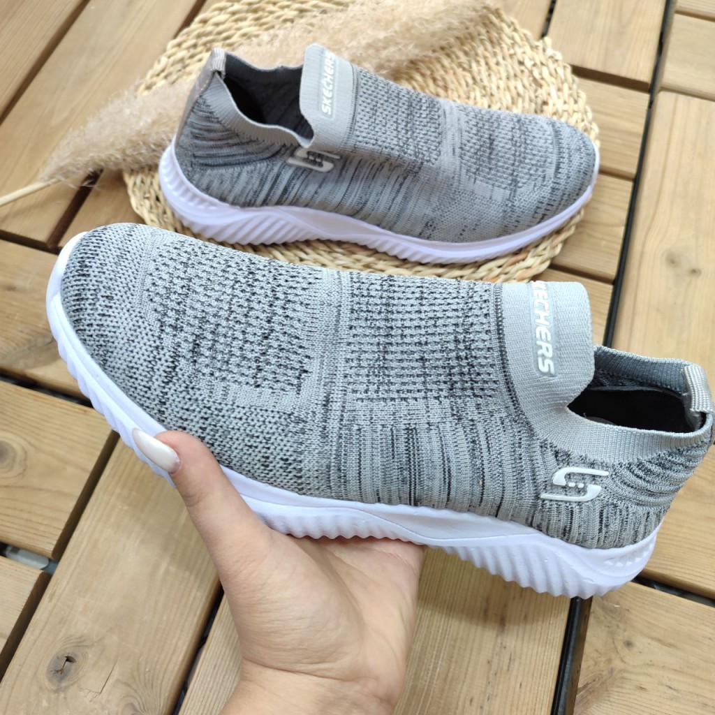 فروش کفش راحتی  مردانه پسرانه مدل اسکیچرز  نرم و با کیفیت .عالی برای پیاده روی رنگ طوسی راه راه  با ارسال رایگان