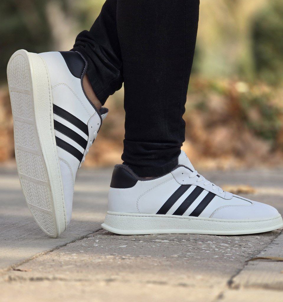 فروش ویژه   کفش اسپرت ونس مردانه  و پسرانه مدل آدیداس رنگ سفید  مشکی فوق العاده راحت و شیک  با ارسال رایگان
