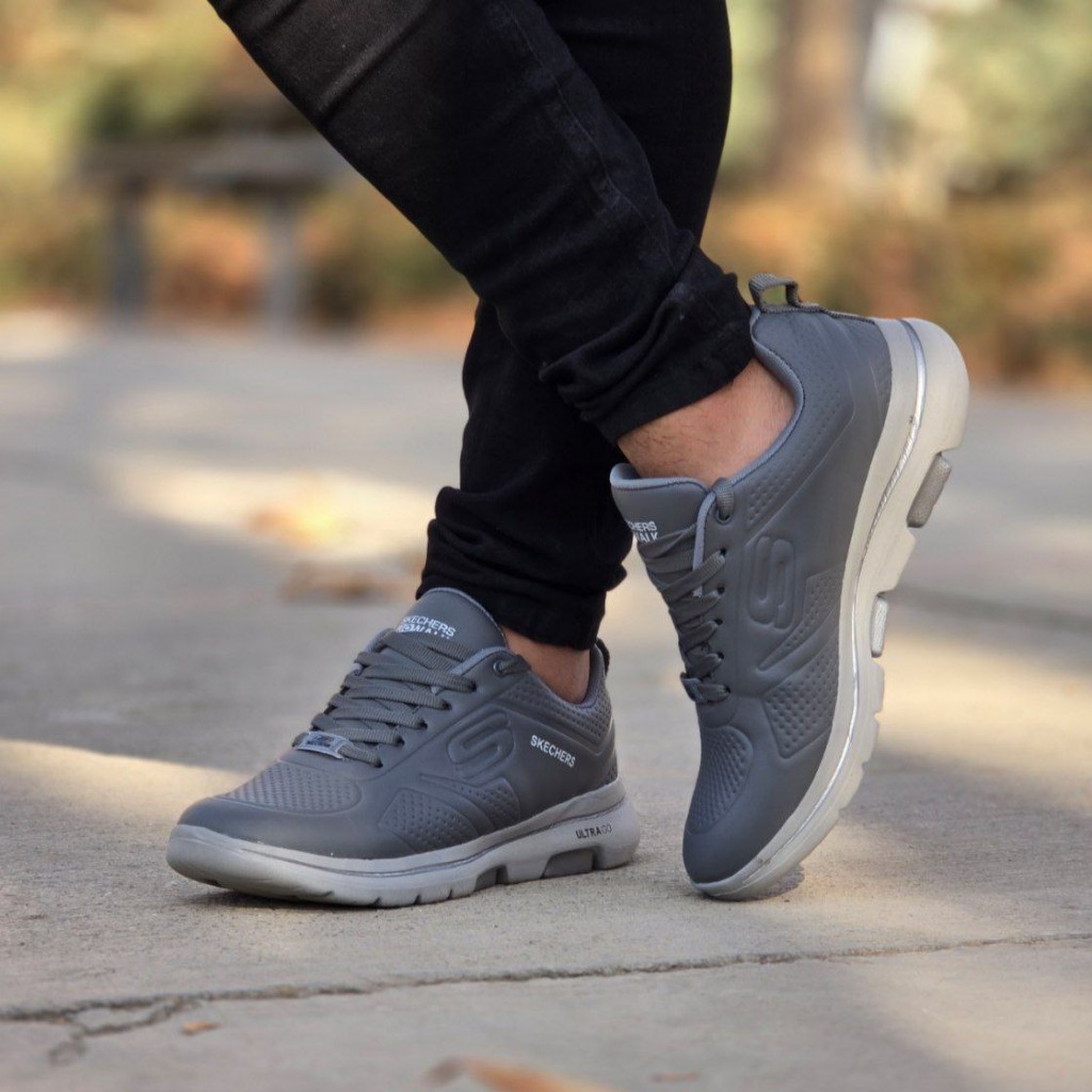 حراج فوق العاده  اسپرت پرطرفدار مردانه مدل اسکیچرز  رنگ مشکی زیره سفید شیک و خاص یه کار فوق العاده پر فروش با ارسال رایگان