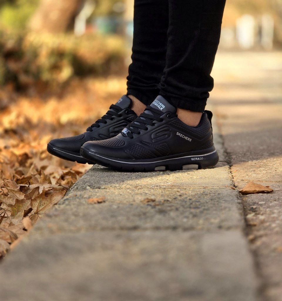 حراج واقعی کفش کتونی اسپرت مردانه و پسرانه مدل اسکیچرز رنگ طوسی تیره جذاب ومناسب افراد خاص با ارسال رایگان