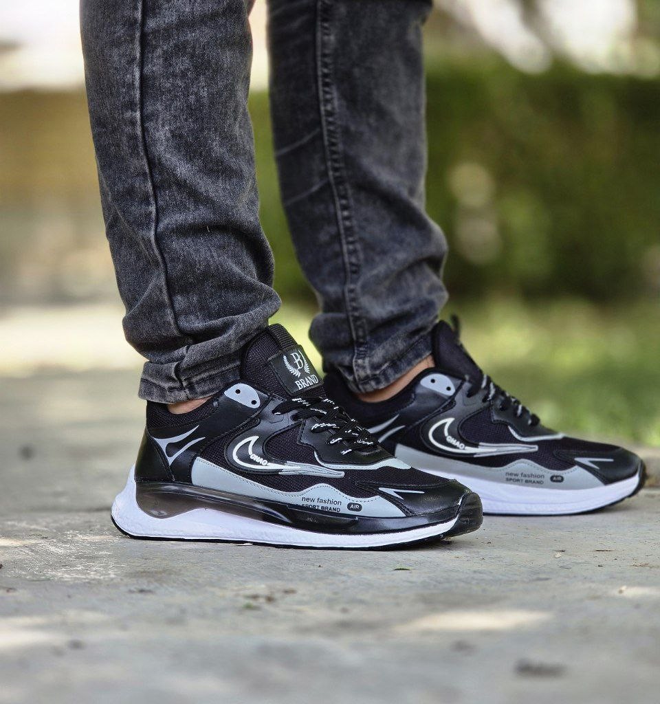 فروش شگفت انگیز  کفش  مردانه  پسرانه مدل نایک  بسیار بادوام و زیبا رنگ مشکی طوسی زیره سفید باارسال رایگان