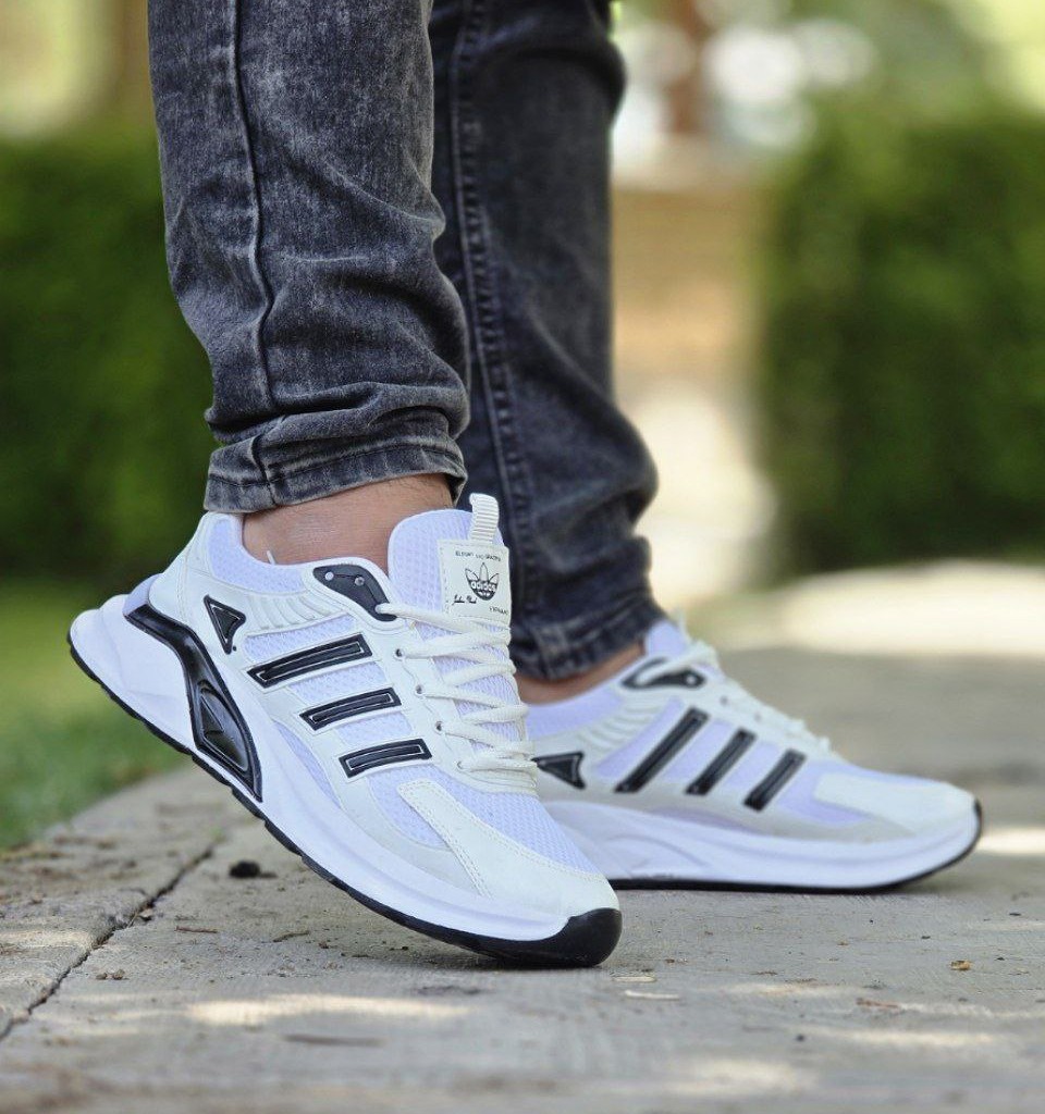 تخفیف فوق العاده   کفش اسپرت مردانه  و پسرانه مدل آدیداس رنگ سفید  طوسی  راحت   با ارسال رایگان