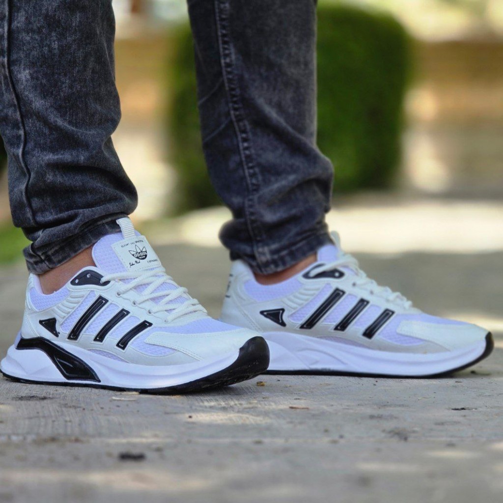 تخفیف فوق العاده   کفش اسپرت مردانه  و پسرانه مدل آدیداس رنگ سفید  طوسی  راحت   با ارسال رایگان