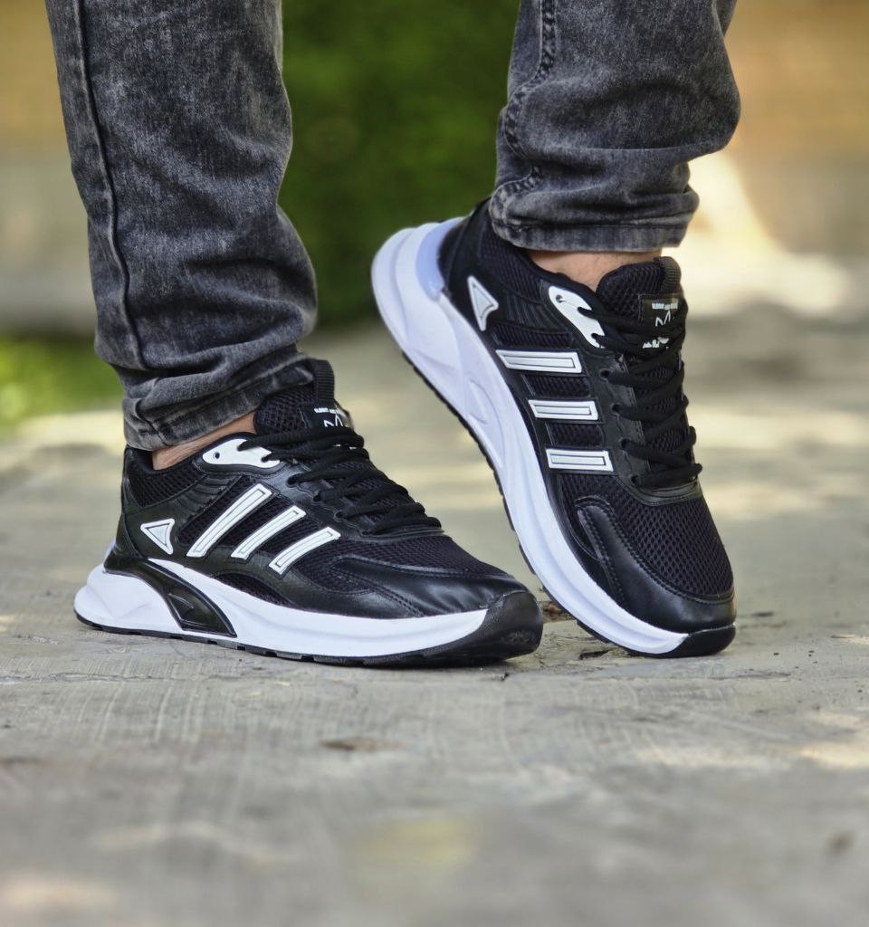 فروش ویژه  کفش اسپرت مردانه  و پسرانه مدل آدیداس  راحت و خاص رنگ سفید  مشکی     با ارسال رایگان