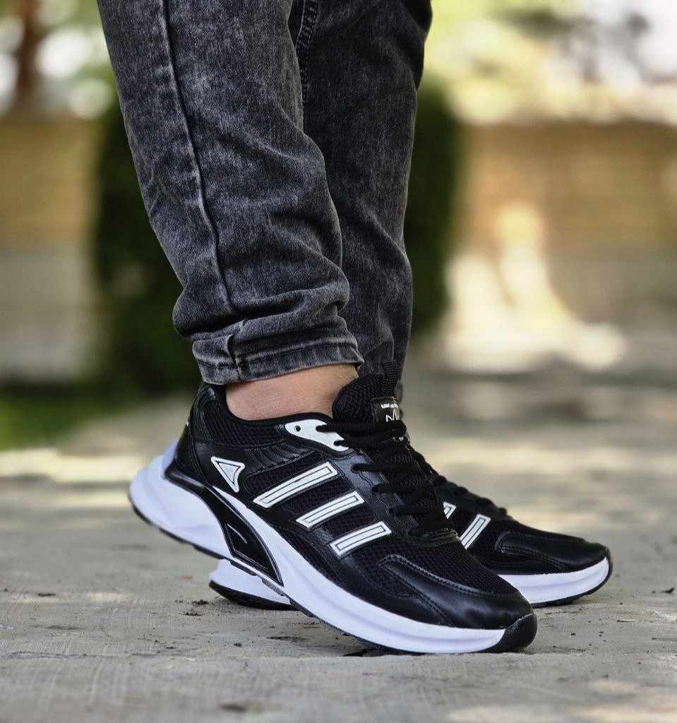 فروش ویژه  کفش اسپرت مردانه  و پسرانه مدل آدیداس  راحت و خاص رنگ سفید  مشکی     با ارسال رایگان