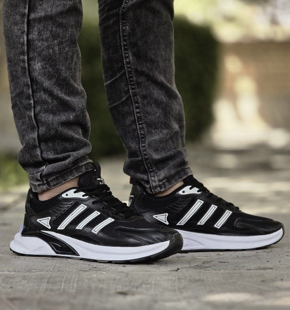 فروش ویژه  کفش اسپرت مردانه  و پسرانه مدل آدیداس  راحت و خاص رنگ سفید  مشکی     با ارسال رایگان