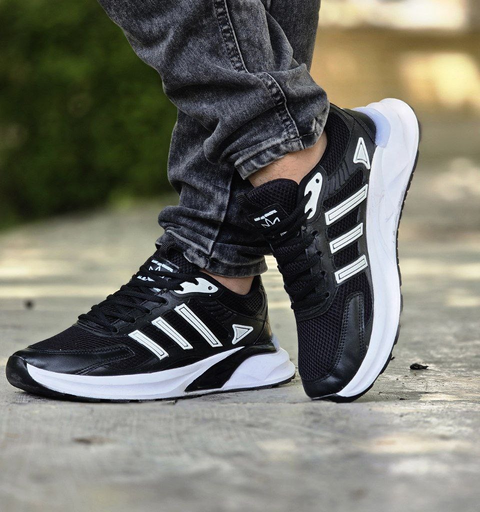 فروش ویژه  کفش اسپرت مردانه  و پسرانه مدل آدیداس  راحت و خاص رنگ سفید  مشکی     با ارسال رایگان