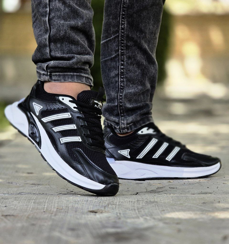 فروش ویژه  کفش اسپرت مردانه  و پسرانه مدل آدیداس  راحت و خاص رنگ سفید  مشکی     با ارسال رایگان