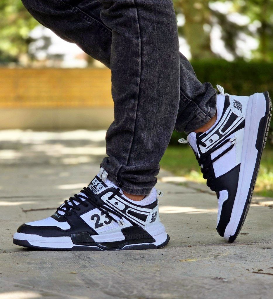 تخفیف استثنایی  کفش اسپرت مردانه و پسرانه مدل جردن 23 رنگ سفید  زیره مشکی جذاب با ارسال رایگان