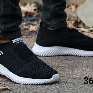 فروش ویژه کفش راحتی  مردانه پسرانه مدل اسکیچرز  نرم و راحت  مناسب پیاده روی رنگ طوسی زیره سفید عالی