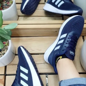 فروش خاص کفش کتونی  اسپرت زنانه مردانه مدل آدیداس اسپیسر جدید و پرفروش رنگ  سرمه ای سفید باارسال رایگان کد 5057