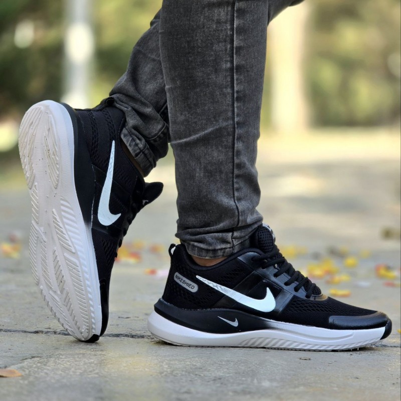 بمب تخفیف این هفته کفش کتونی اسپرت مردانه و پسرانه مدل نایک رنگ مشکی سفید بی نهایت خوشپا و خوش فرم با ارسال رایگان