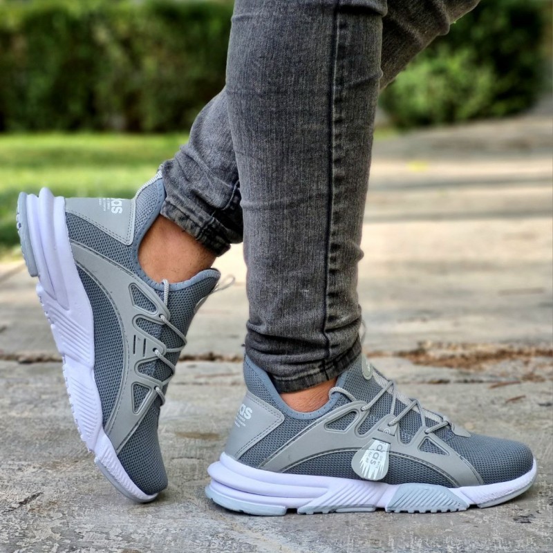 حراج باورنکردنی کفش کتونی اسپرت بافت مردانه و پسرانه رنگ طوسی  زیره سفید یه کار جدید و فوق العاده نرم با ارسال رایگان