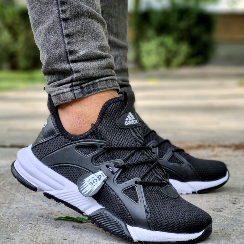 فروش ویژه کفش کتونی اسپرت مردانه و پسرانه مدل بافت رنگ مشکی زیره سفید یه کار فوق العاده راحت و نرم با ارسال رایگان