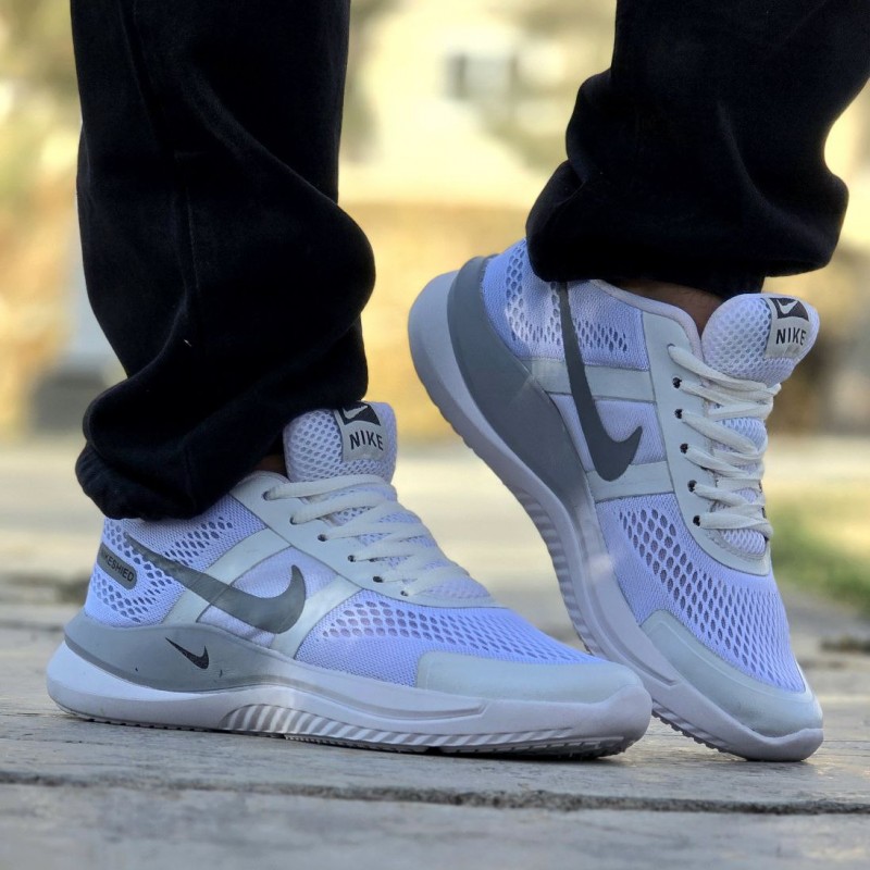 حراج جدید ترین کفش کتونی پسرانه و مردانه مدل نایک رنگ سفید طوسی  زیره پیو  بادوام و مقاوم با ارسال رایگان