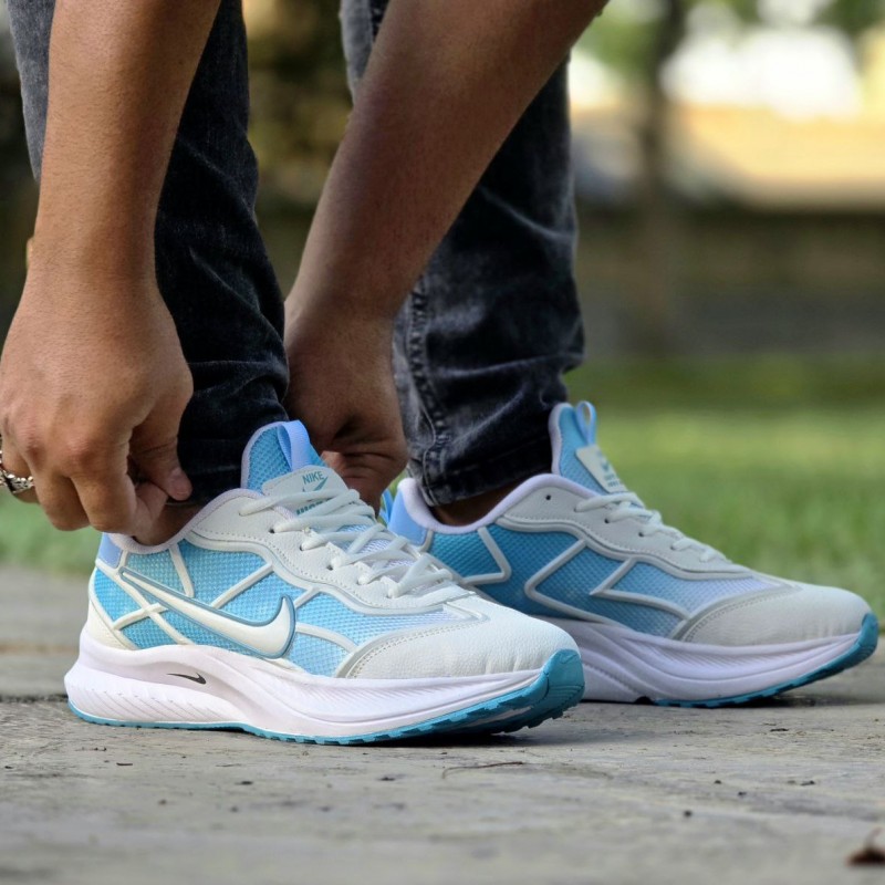 حراااااااج  کفش اسپرت مردانه و پسرانه مدل نایک به روز و بادوام رنگ سفیدآبی با ارسال رایگان