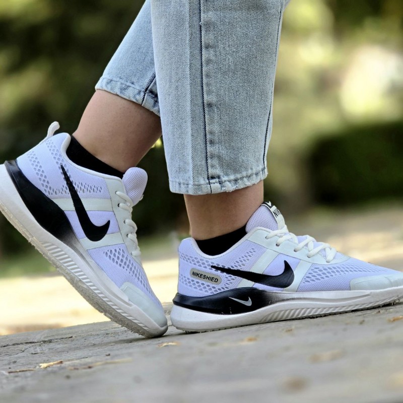 حراج ویژه کفش کتونی اسپرت نایک گام لند زنانه و مردانه  پرفروش و پرطرفدار رنگ سفید مشکی با ارسال رایگان