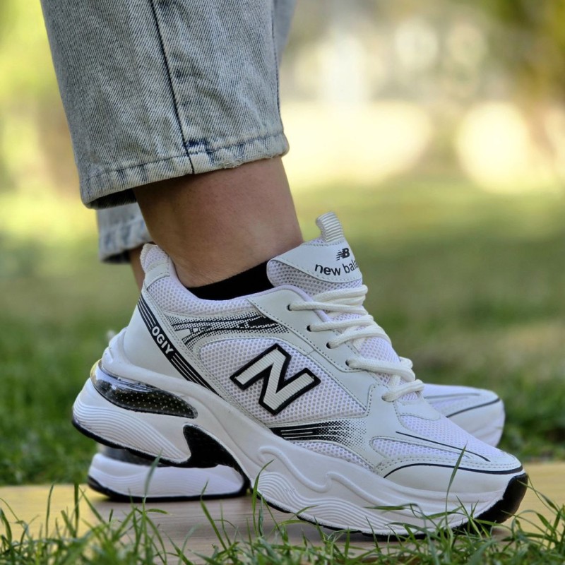 فروش جذاب کفش اسپرت دخترانه زنانه مدل نیوبالانس  طرح کپسولی  بادوام و کیفیت عالی رنگ سفید مشکی با ارسال رایگان