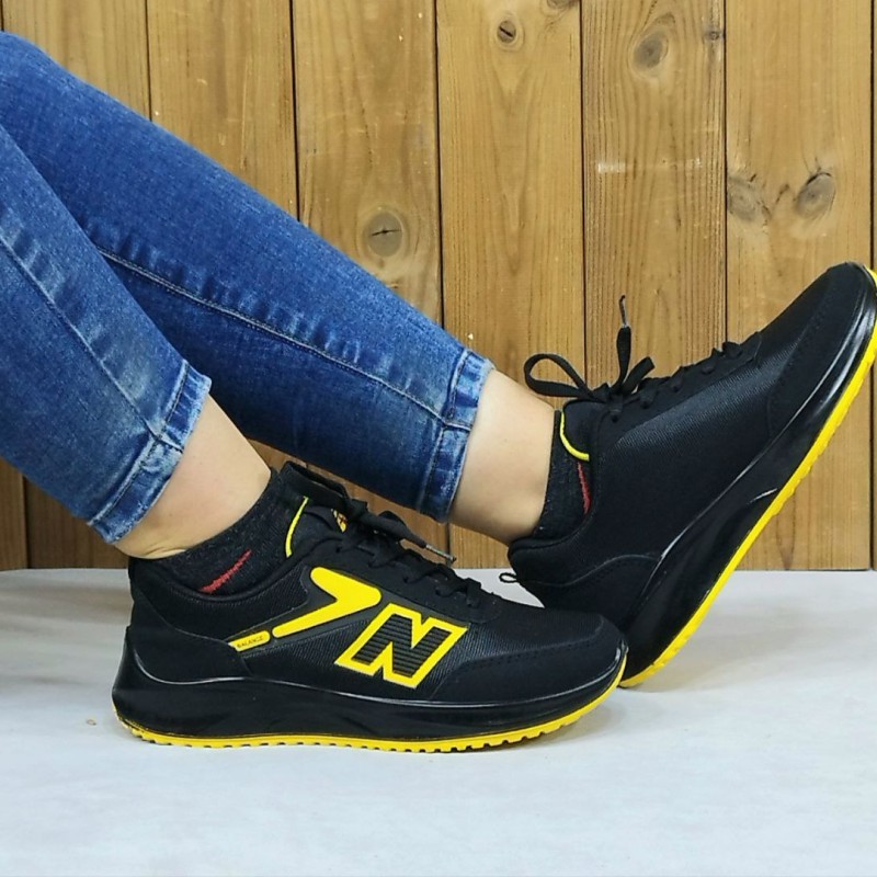 کفش اسپرت کتونی دخترانه زنانه مدل نیوبالانس با کیفیت و شیک رنگ مشکی زرد کد4570