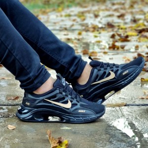 کفش کتونی اسپرت مردانه و پسرانه نایک زیره کپسولی مشکی طلایی زیره طبی و راحت 3634