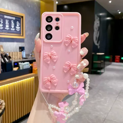 قاب گوشی فانتزی با پاپیون برجسته و آویز دستبند مرواریدی