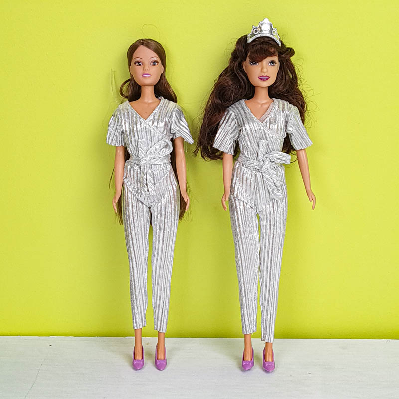 عروسک باربی با لباس اورال نقره ای مو مشکی تک عددی کد P/HC06/A