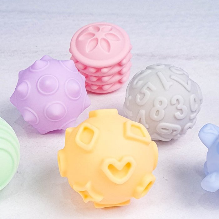 توپ حسی 6 عددی جغجغه ای رنگ پاستلی کد 1866W