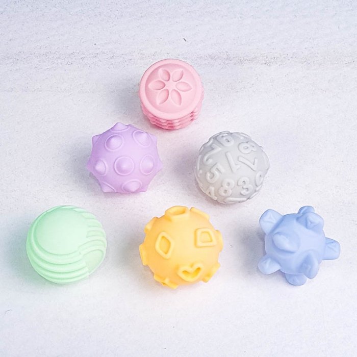 توپ حسی 6 عددی جغجغه ای رنگ پاستلی کد 1866W