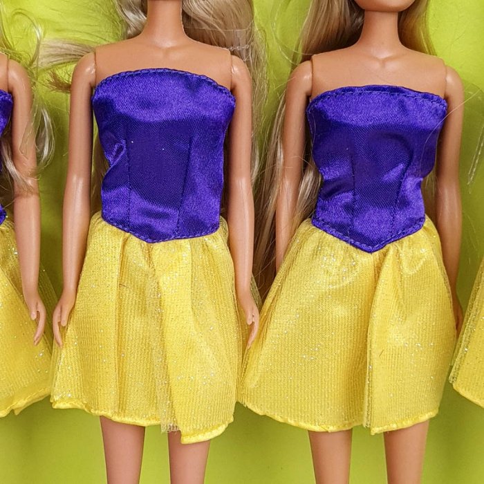 عروسک باربی با لباس دکلته بنفش زرد کد P/HC06/D