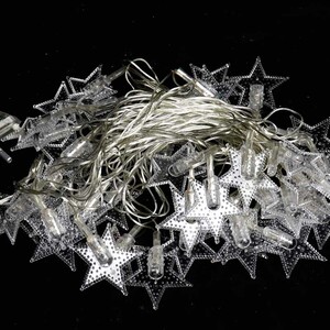 ریسه 38 لامپ طرح ستاره دون دار شیشه ای رنگی طول 5 متر