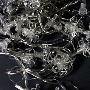 ریسه طرح گل یاس 28 لامپ آفتابی طول 3 متر