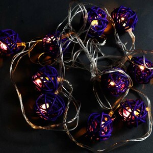 ریسه طرح گوی چوبی بنفش 10 لامپ آفتابی طول 2.5 متر