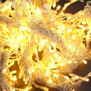 ریسه پرده ای 300 لامپ طرح سوزنی آفتابی 3 متری با آویز 2 متری