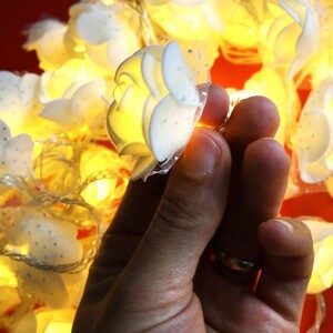 ریسه طرح گل فوم سفید آفتابی طول 9 متر