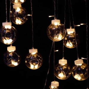 ریسه پرده ای طرح لامپ حبابی آفتابی طول 4 متر