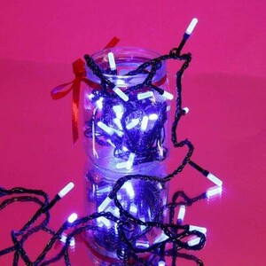 ریسه کریستالی 100 لامپ سیم مشکی طول 8٫5 متر