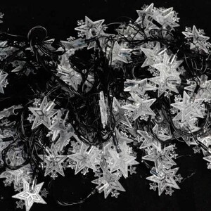 ریسه طرح ستاره برفکی سیم مشکی آفتابی طول 8.5 متر