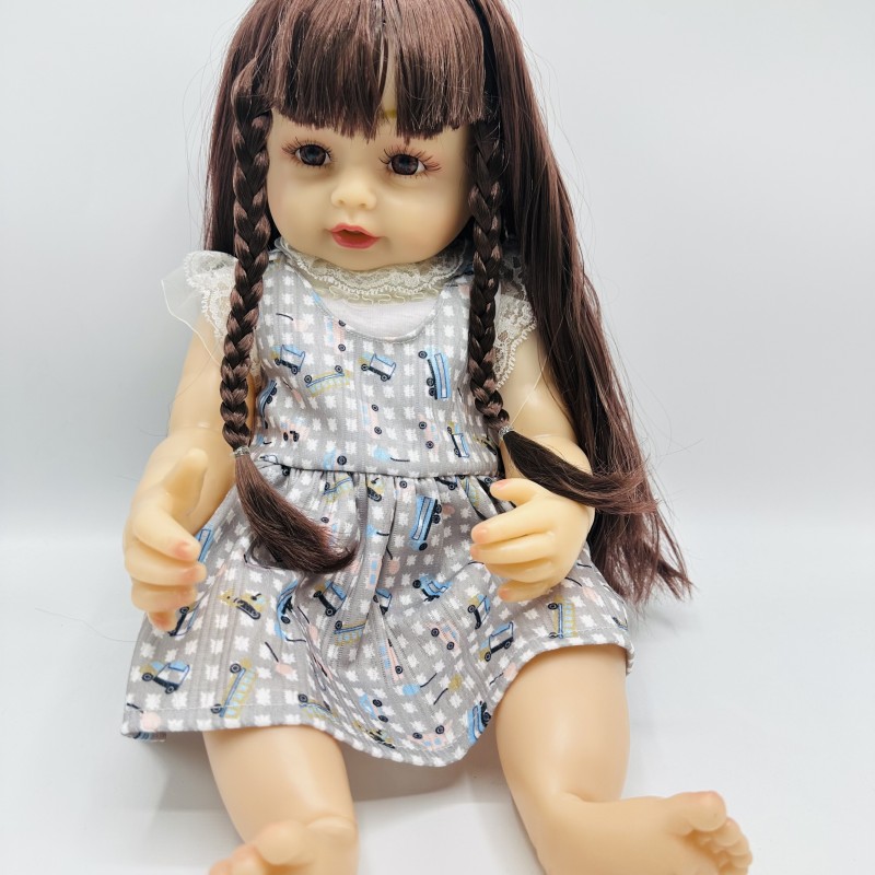 عروسک نوزادی سیلیکونی مدل Fashion Doll - لباس خاکستری طرح‌دار با جزئیات طبیعی