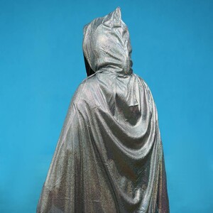 شنل کلاه دار براق A shiny hooded cape&#8230;