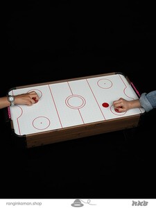 ایر هاکی روی میز برقی Air hockey on an electric table