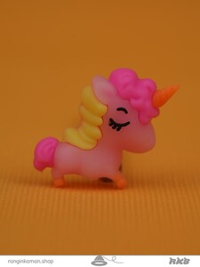 سرمدادی فانتزی سیلیکونی طرح یونیکورن خوابیده پروازی Fantasy silicone earring with flying sleeping unicorn design