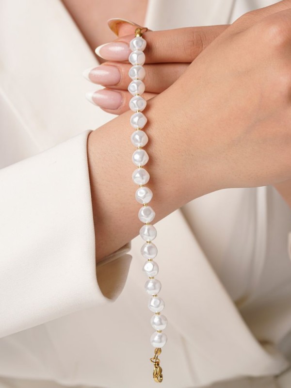 دستبند مروارید توپی 8.5 میل طلایی کد B004